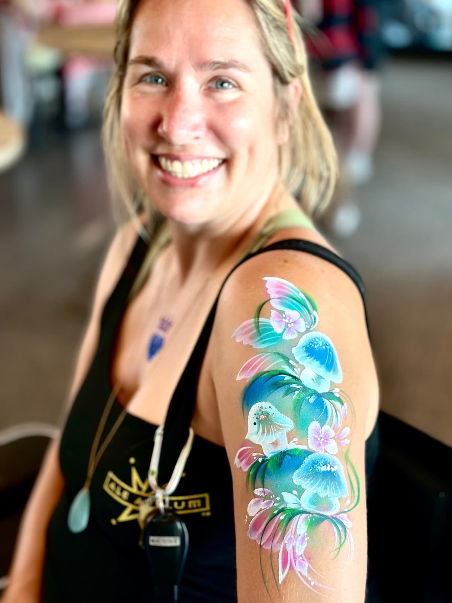 Teal floral arm design