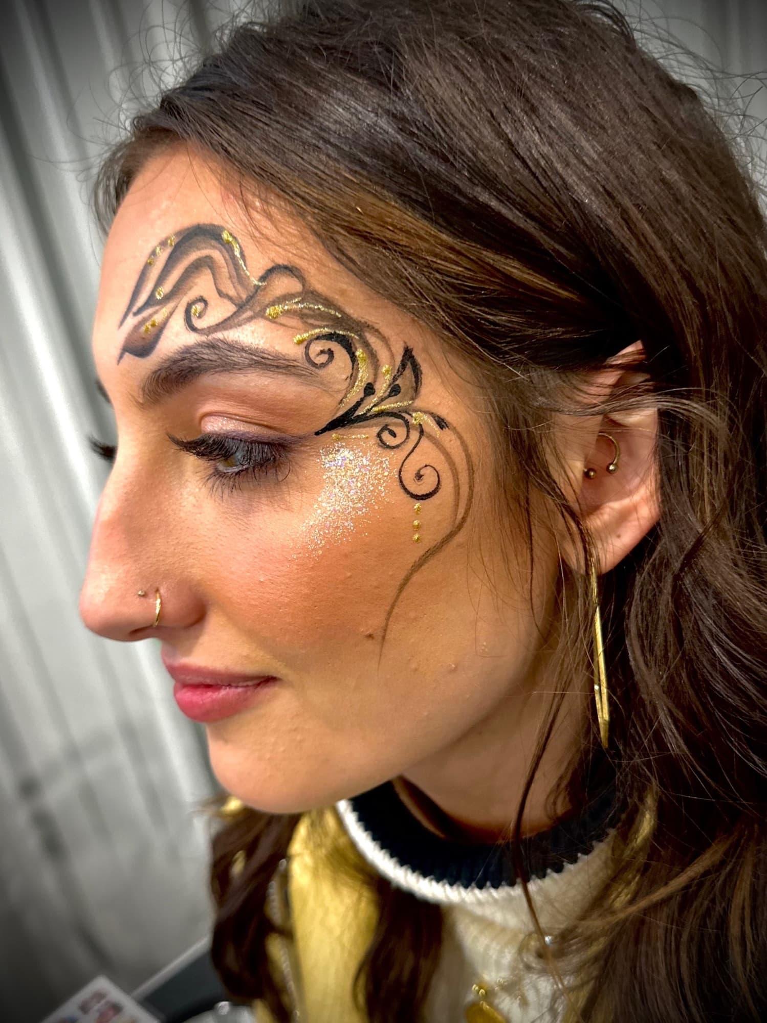 Gold filigree eye design
