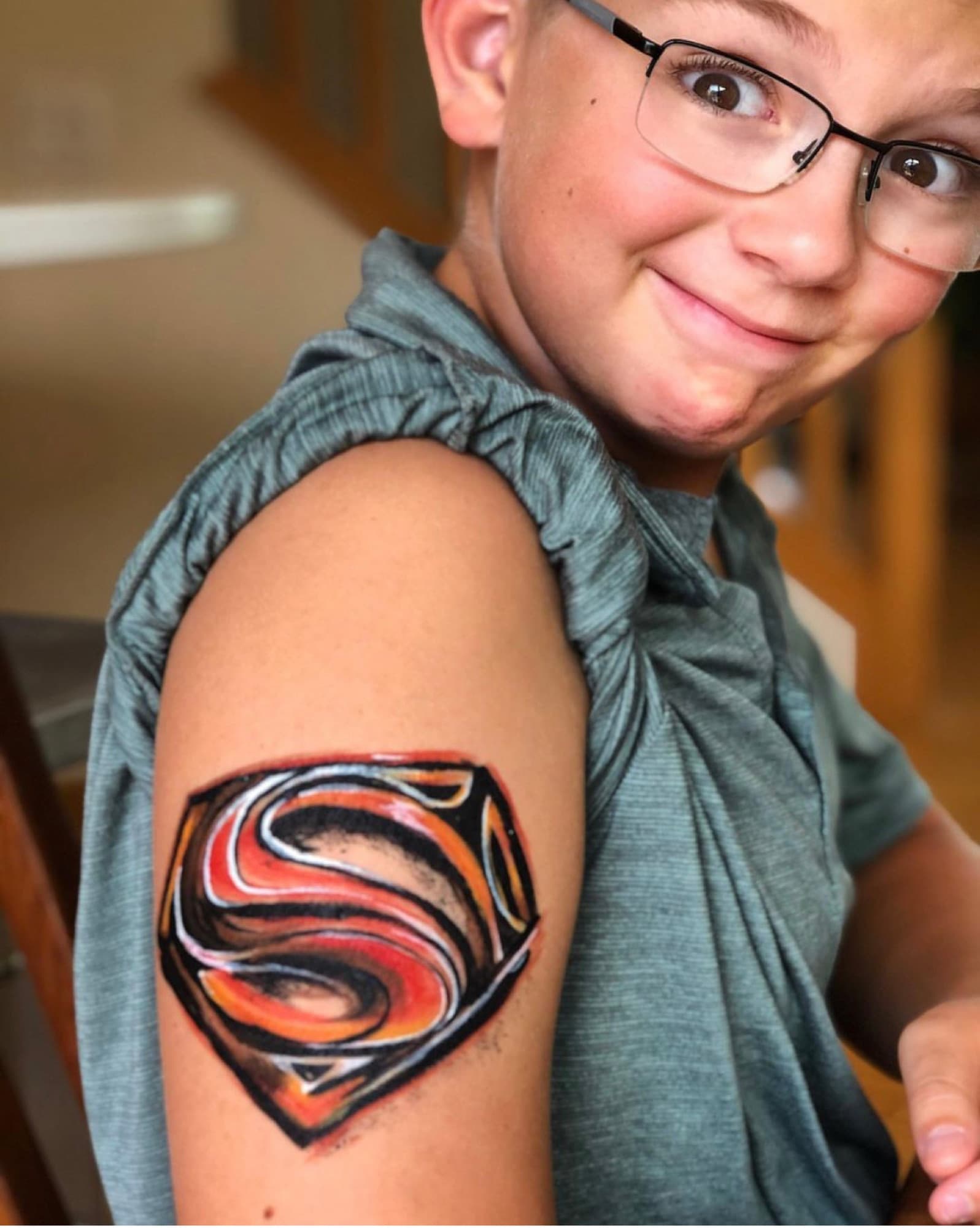 Superhero shield on an arm