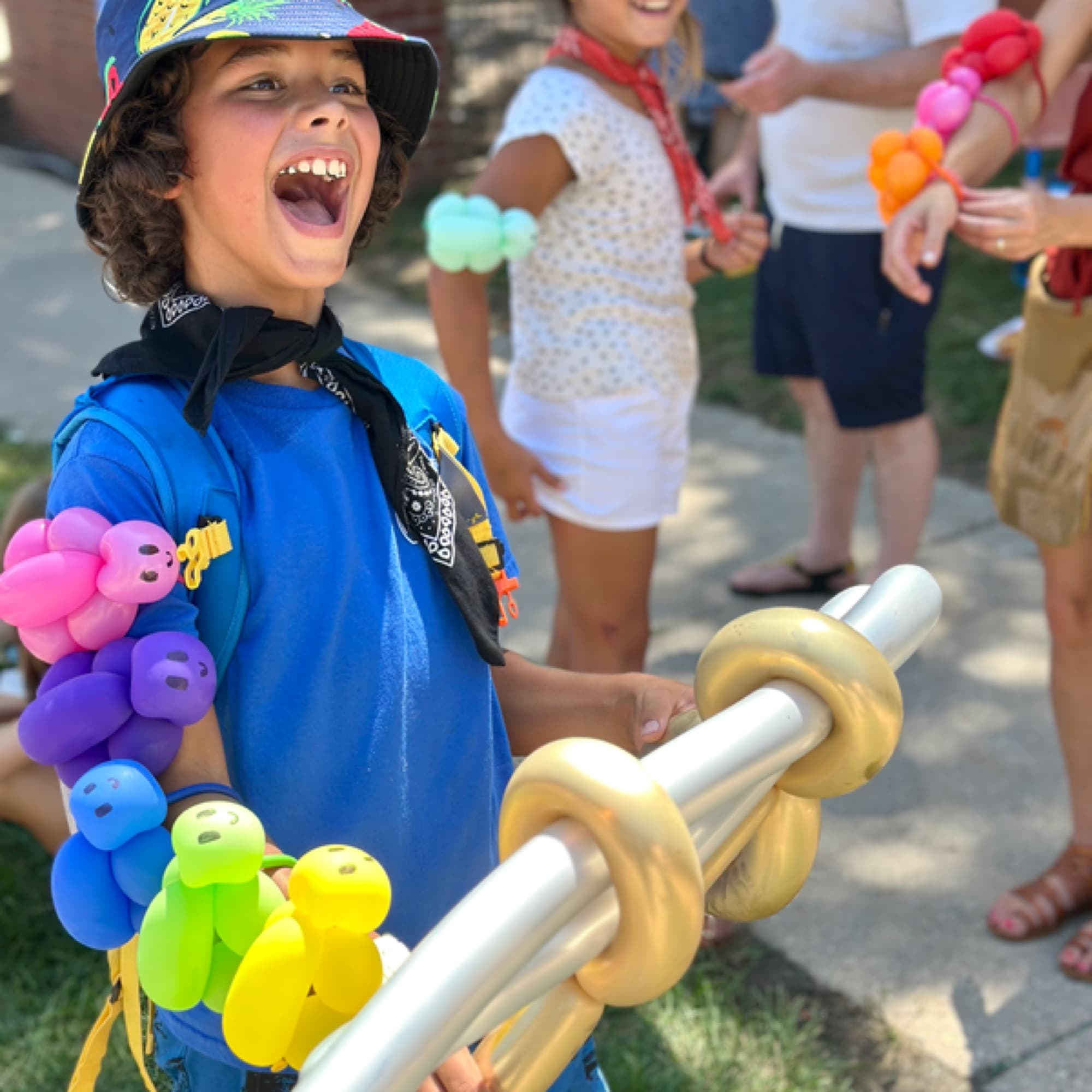 Kids with balloon swords