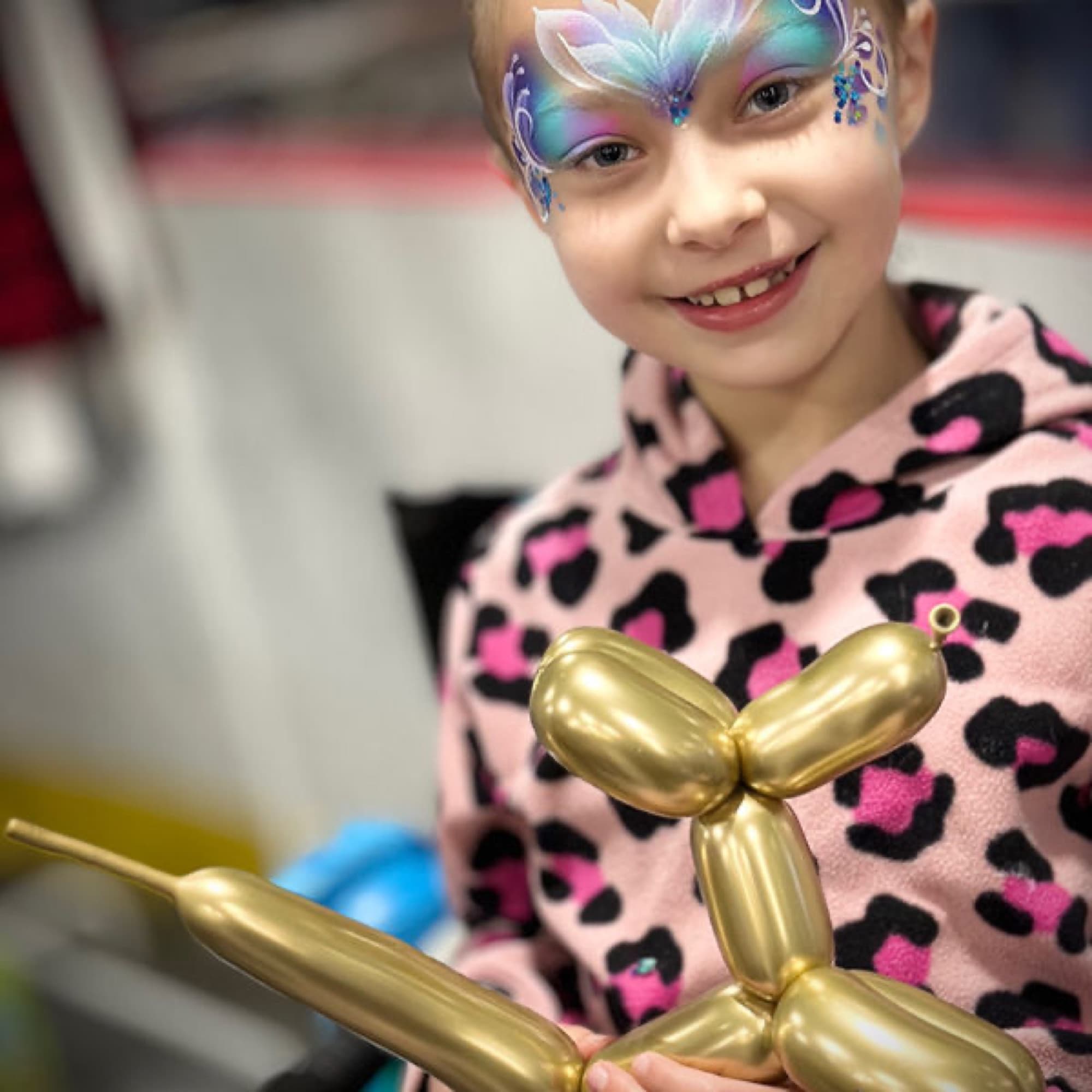 Gold balloon animal