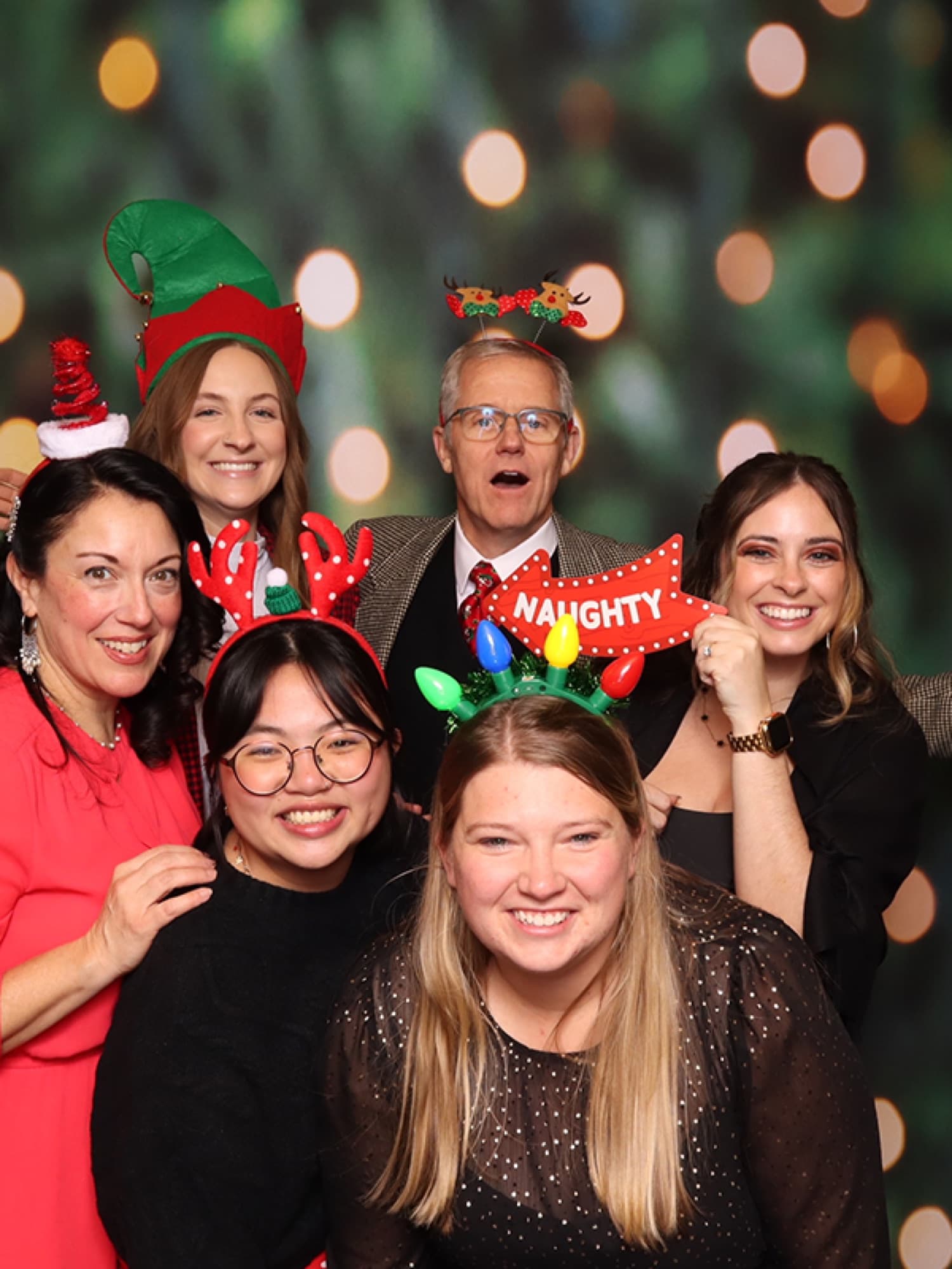Holiday party group in festive hats
