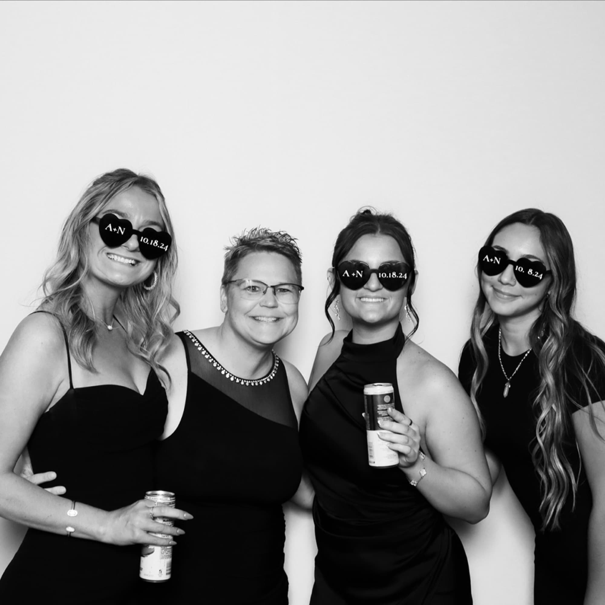 Friends in sunglasses in black and white